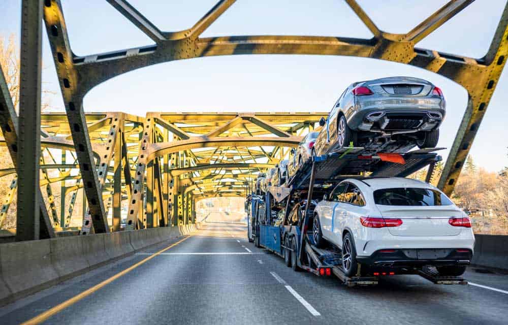 A car carrier truck on a bridge